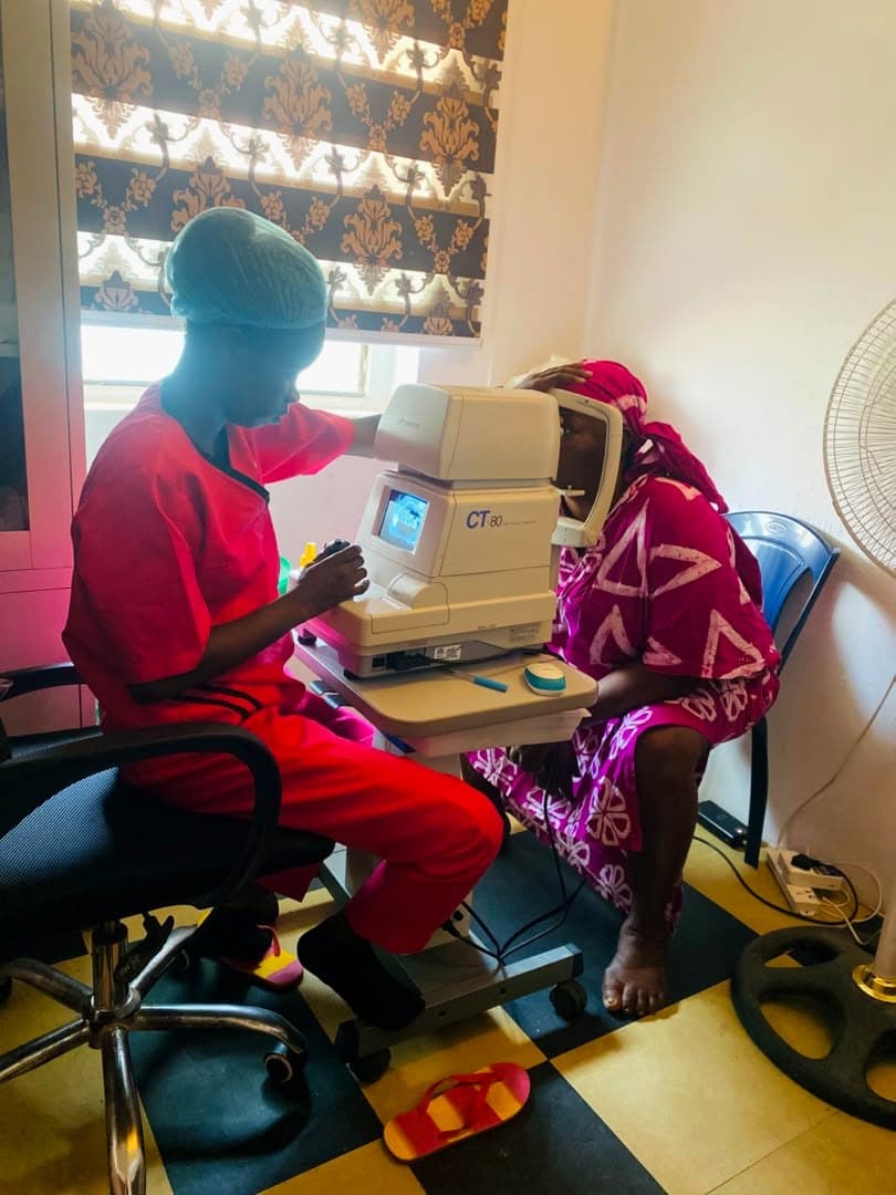 A God First clinician measuring a patient's eye pressure on the CT.80 tonometer